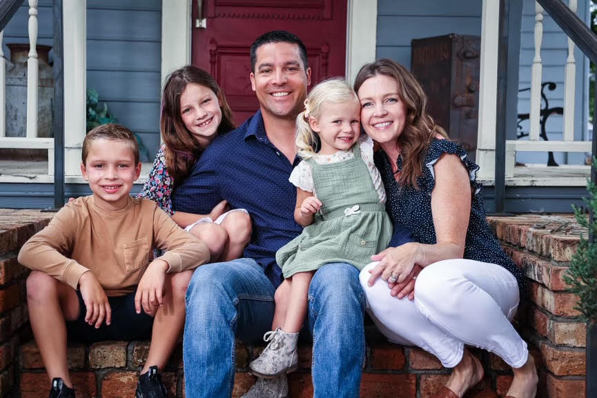 Scott Moore, Owner of Turf Layers with his family