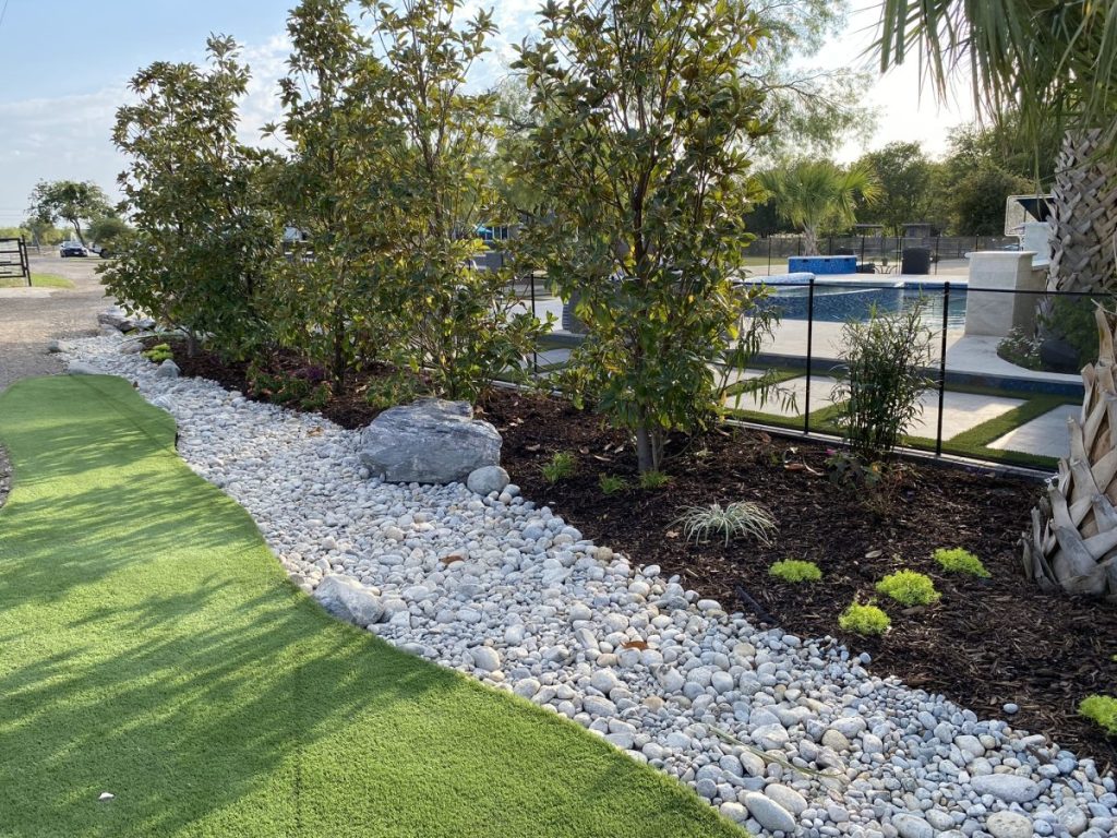 artificial turf installation and hardscaping