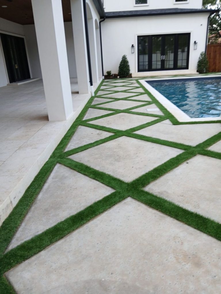 How to Create a Low-Maintenance Outdoor Oasis with Turf and Hardscaping